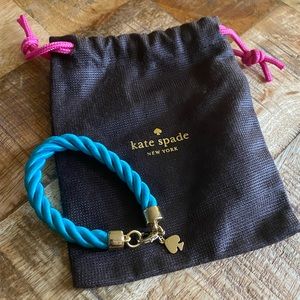 Kate Spade bracelet. Teal cord with gold accents.
